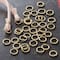 12 Pack: Gold Finish Jump Rings by Bead Landing™